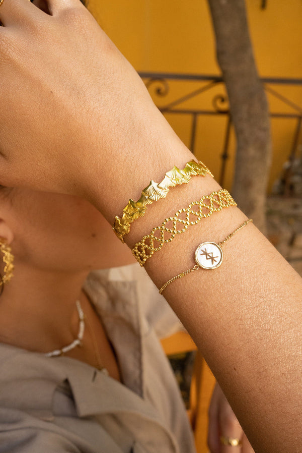 Vintage gold bangle bracelet with twisted shapes ~ GEBAN